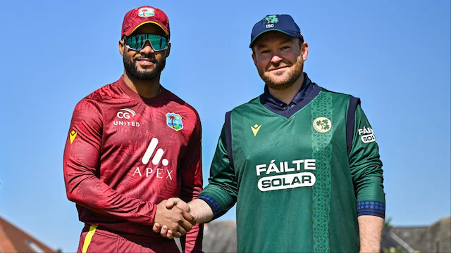 Ireland vs West Indies players greet each other during the T20I match at Bready Cricket Club